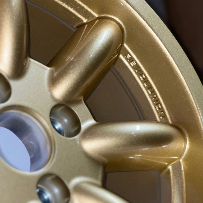 7x15 Revolution 8 spoke Gold